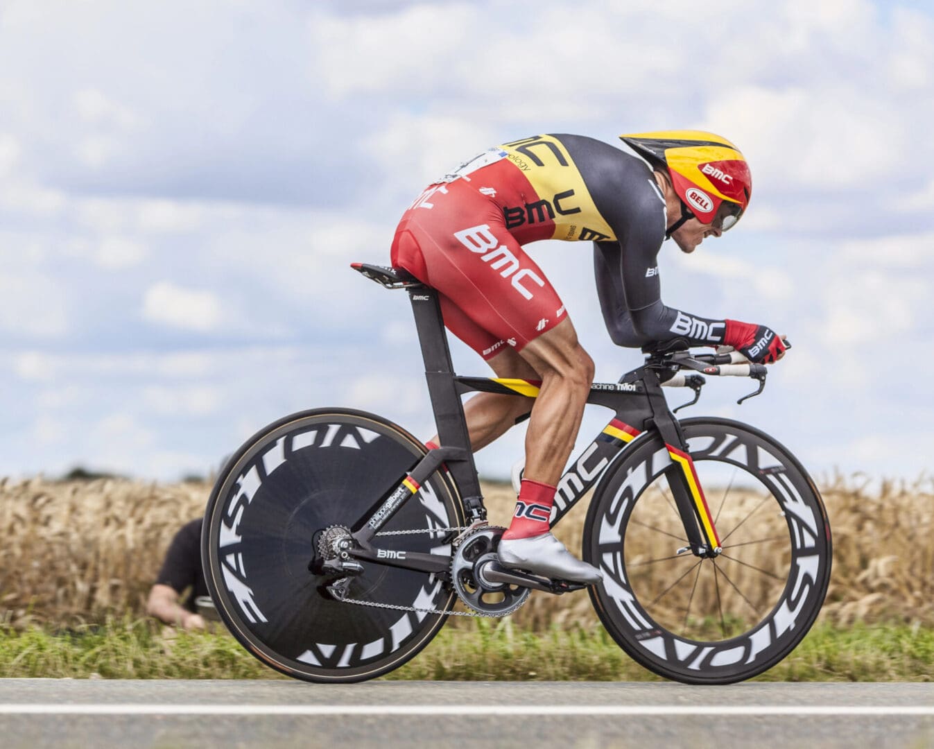 Time-trial cyclist on aerodynamic disc-wheel bike