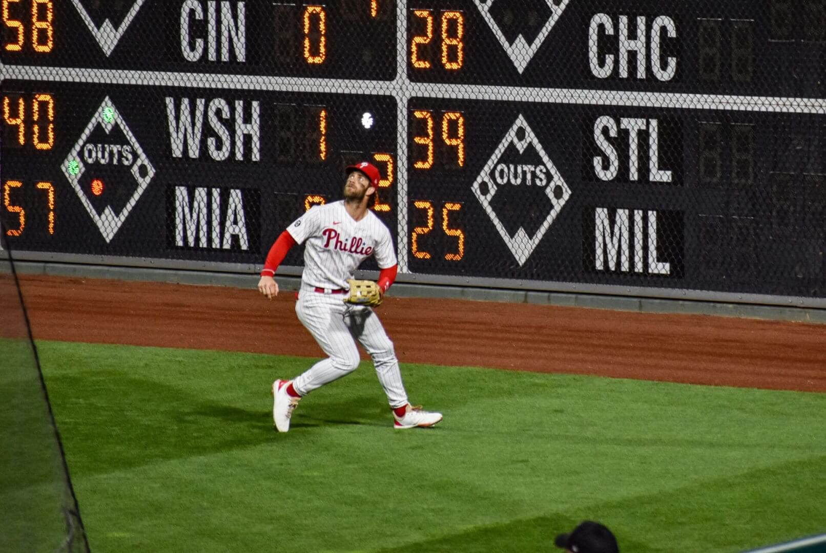A baseball player in the outfield during a game.