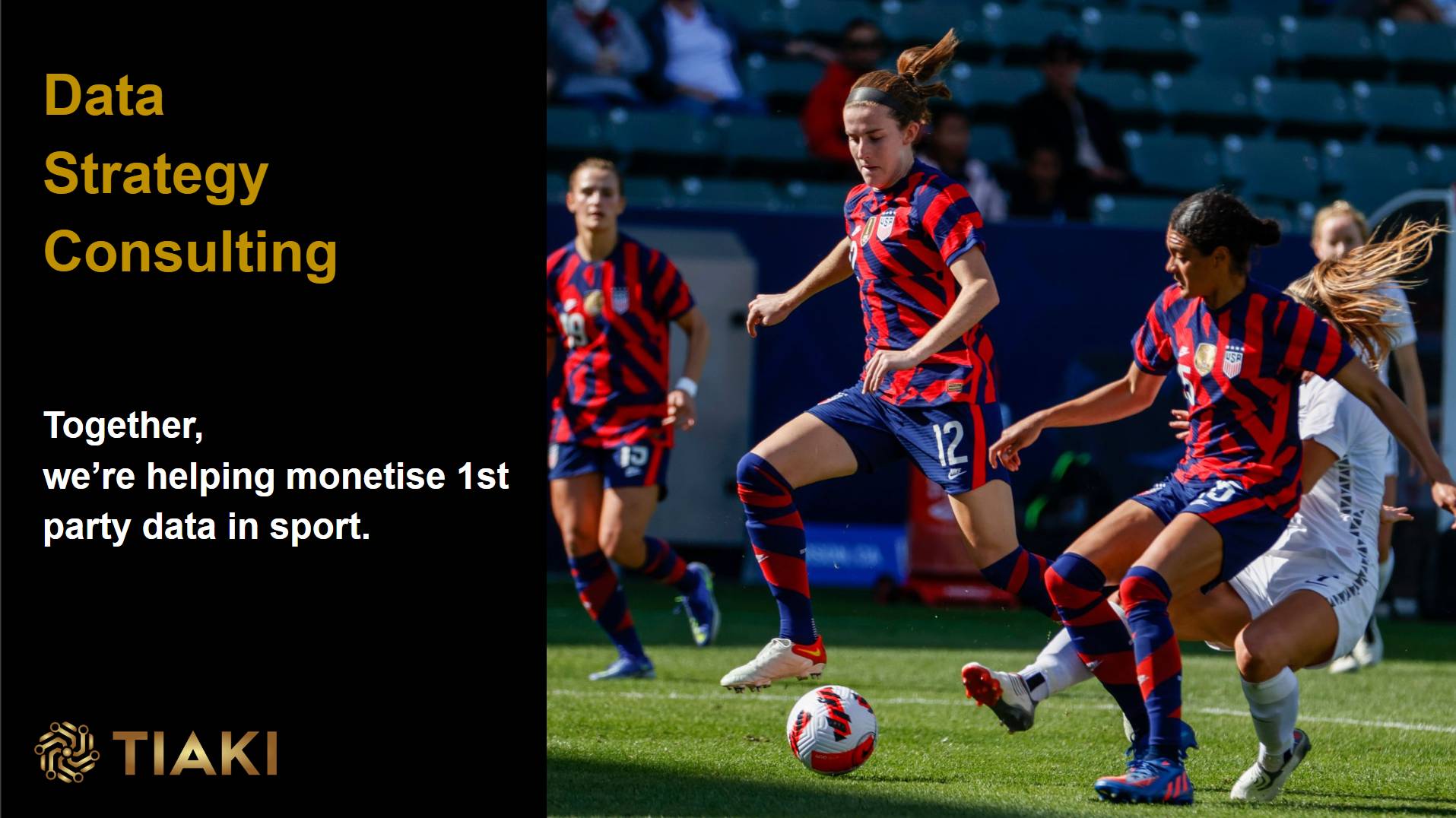 Women playing soccer in team uniforms.