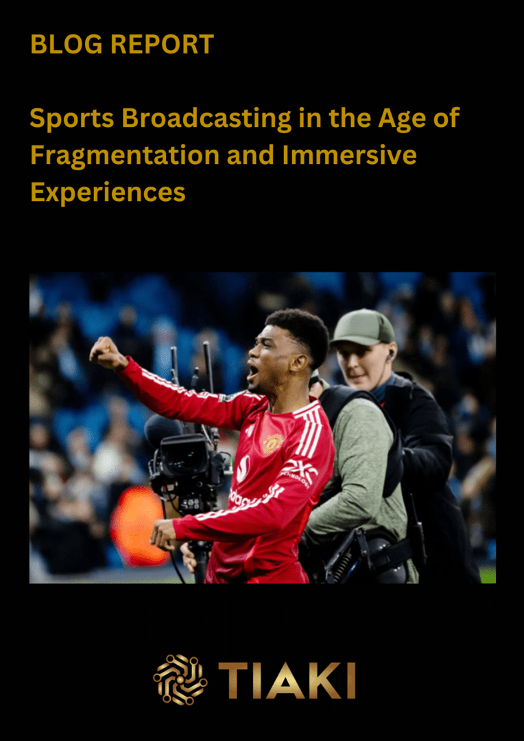 Soccer player celebrating with camera crew nearby.