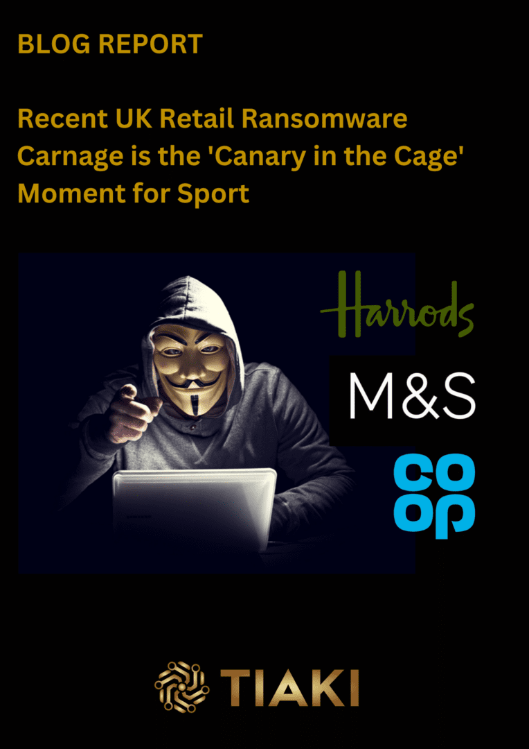 Hacker in mask with laptop, retail logos.