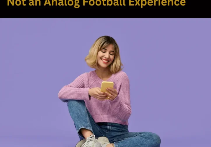 Smiling young woman cross-legged using smartphone