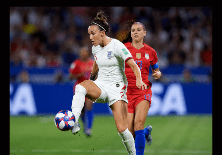 Soccer players competing in a dynamic match.
