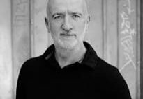 A black and white photo of an older man